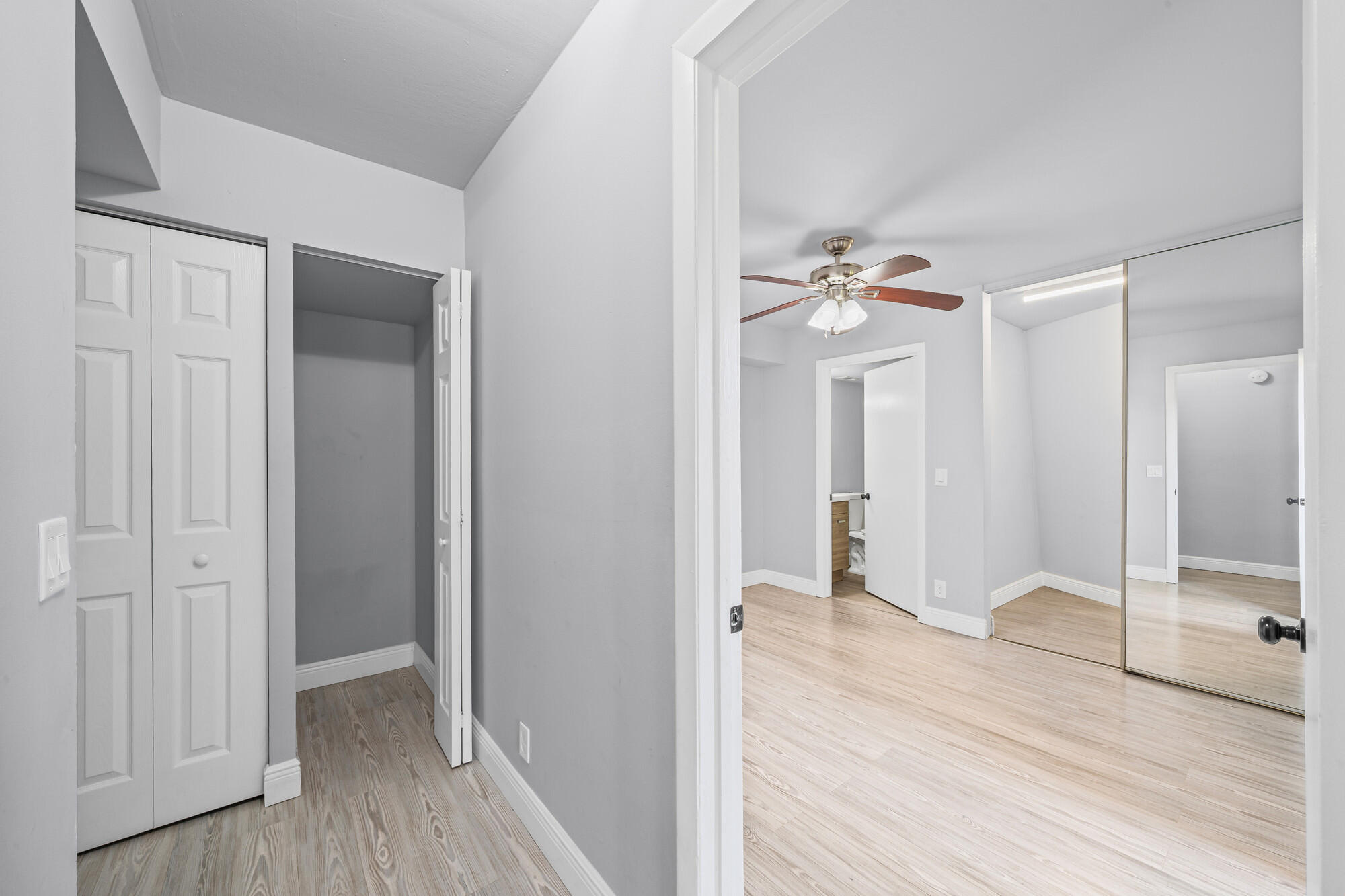 8194 Thames Boulevard, Unit B Boca Raton, FL 33433 - Photo 32 of 49 a view of a room with wooden floor and a bathroom