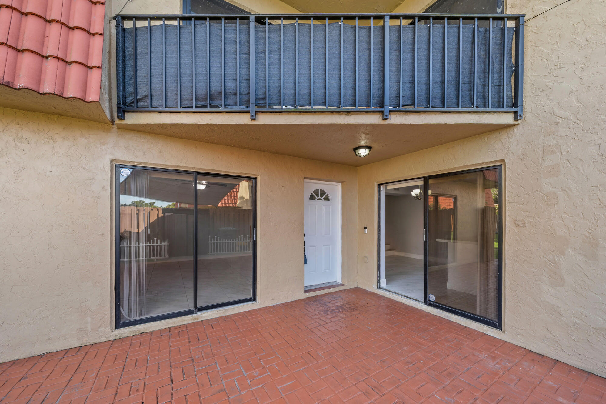 8194 Thames Boulevard, Unit B Boca Raton, FL 33433 - Photo 4 of 49 a view of a wooden door and an outdoor space