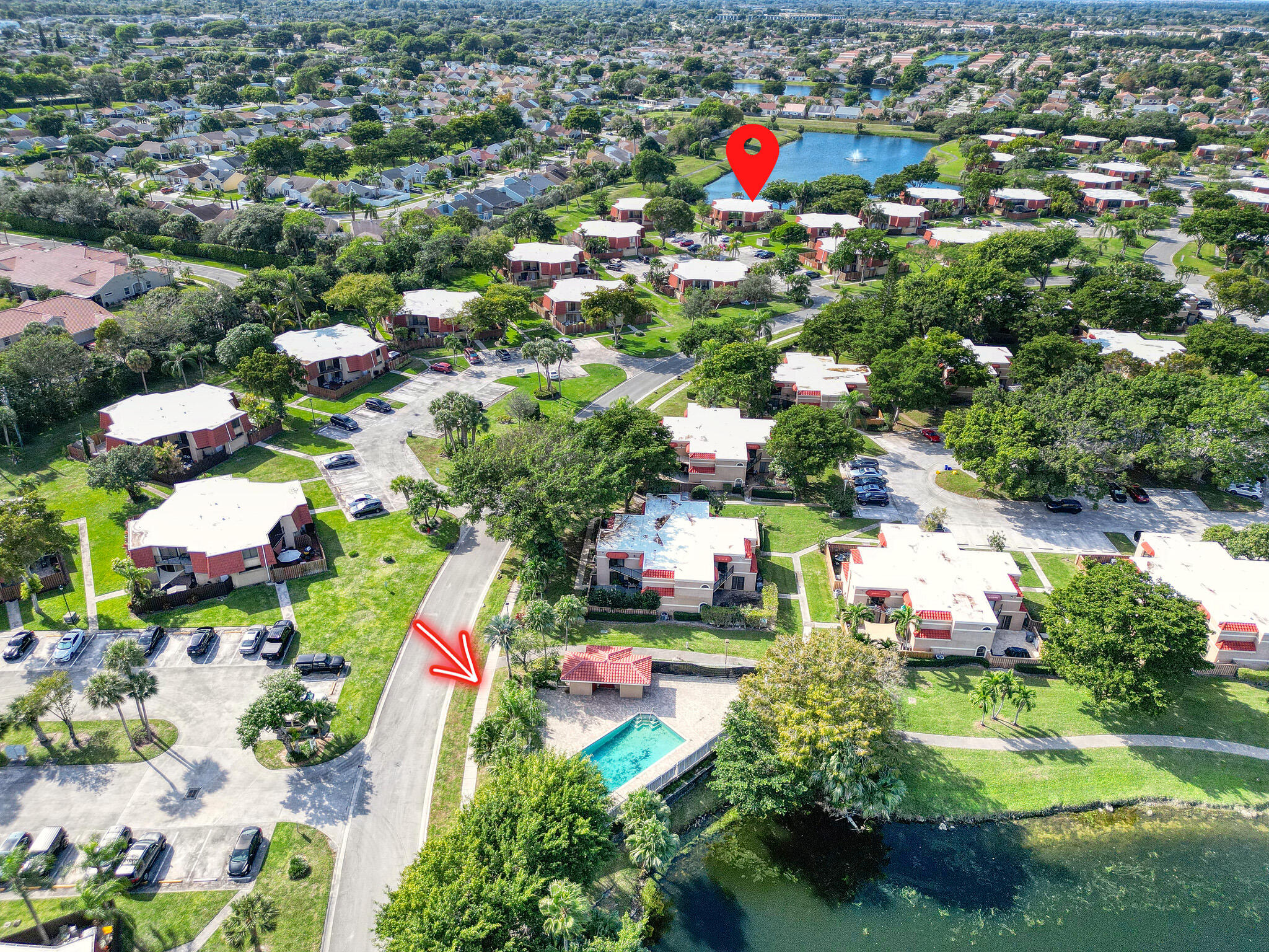 8194 Thames Boulevard, Unit B Boca Raton, FL 33433 - Photo 47 of 49 an aerial view of residential houses with outdoor space and swimming pool