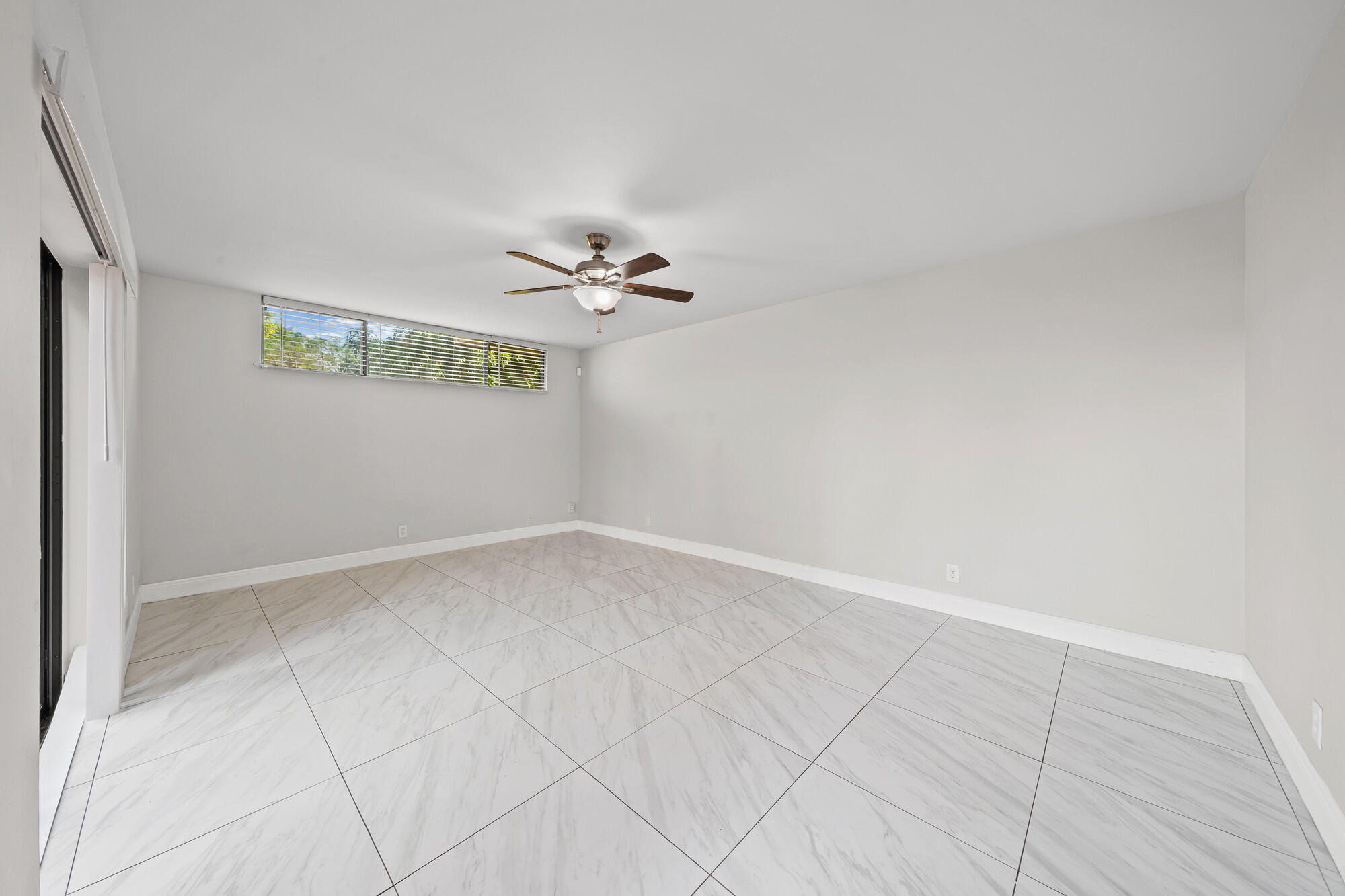 8194 Thames Boulevard, Unit B Boca Raton, FL 33433 - Photo 10 of 49 a view of an empty room