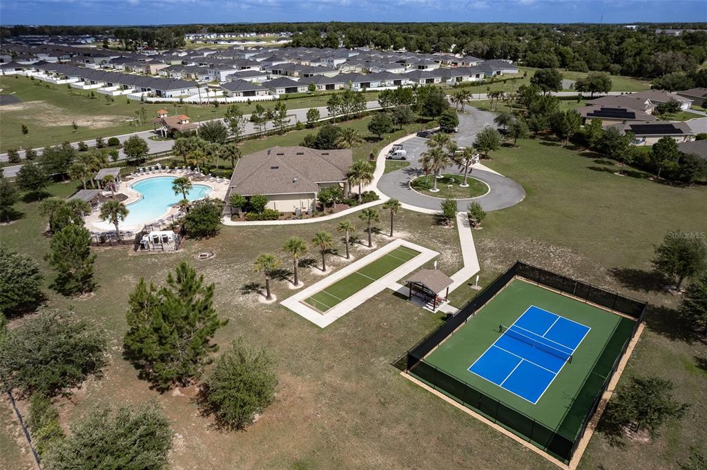 9224 Southwest 60th Ct Road Ocala, FL 34476 - Photo 50 of 55 an aerial view of a house with a lake view