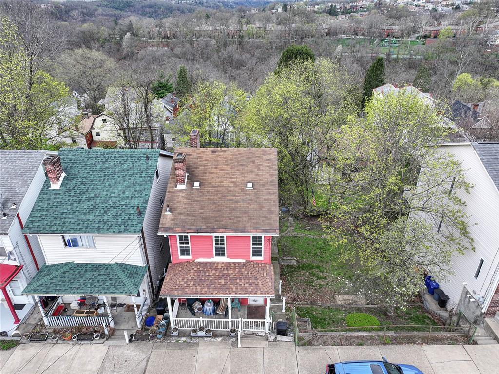 450 Natchez Street Pittsburgh, PA 15211 - Photo 2 of 31 Front of the house and additional lot included in sale