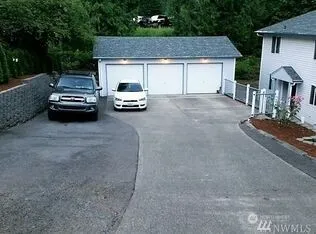 a car parked in front of a house