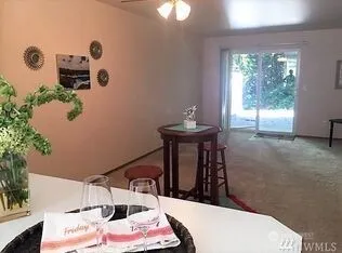 a bed room with a bed and a table