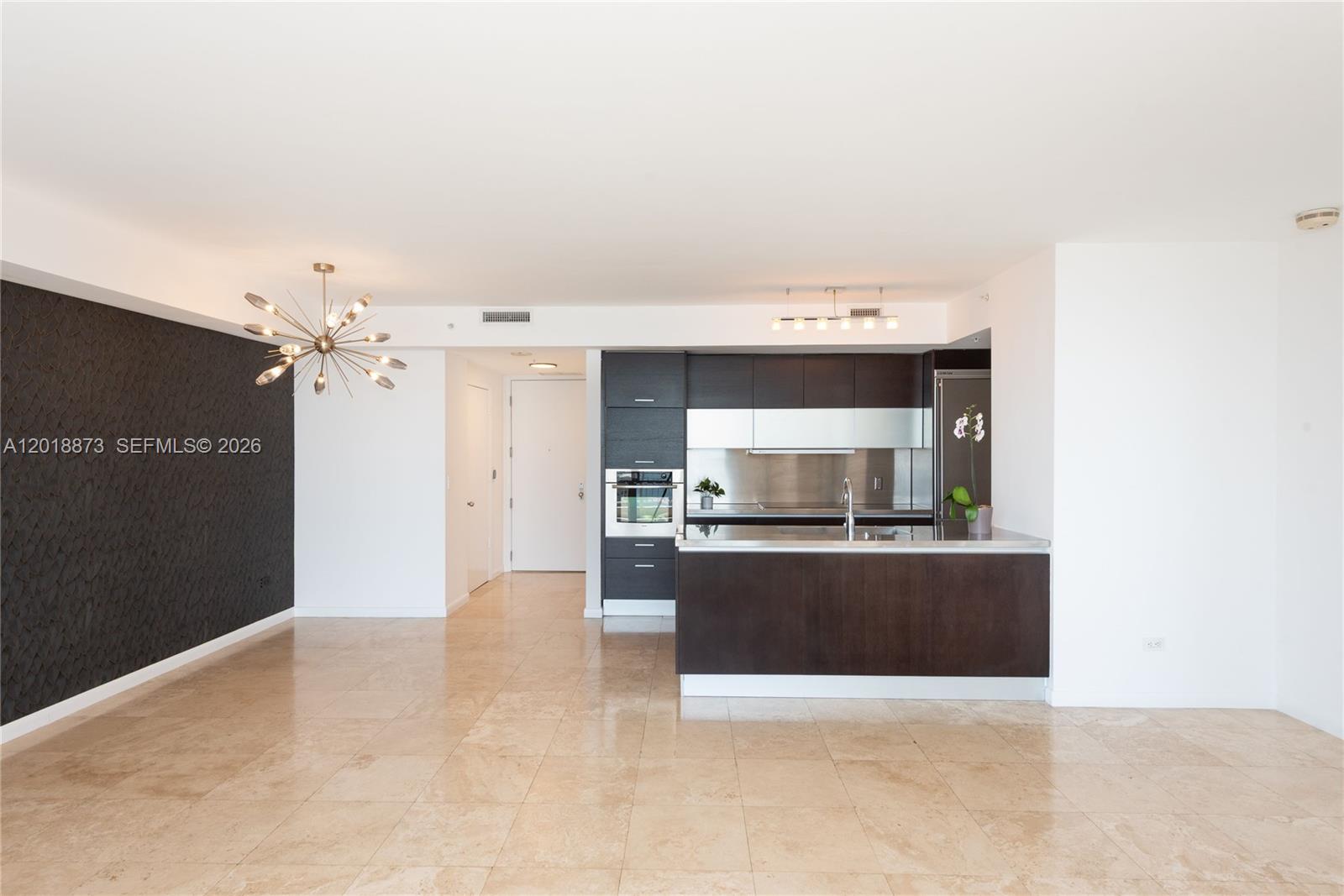 848 Brickell Key Drive, Unit 2703 Miami, FL 33131 - Photo 19 of 30 a view of kitchen and kitchen