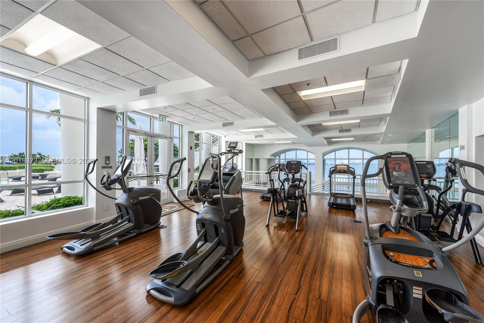 848 Brickell Key Drive, Unit 2703 Miami, FL 33131 - Photo 24 of 30 a view of a room with gym equipment