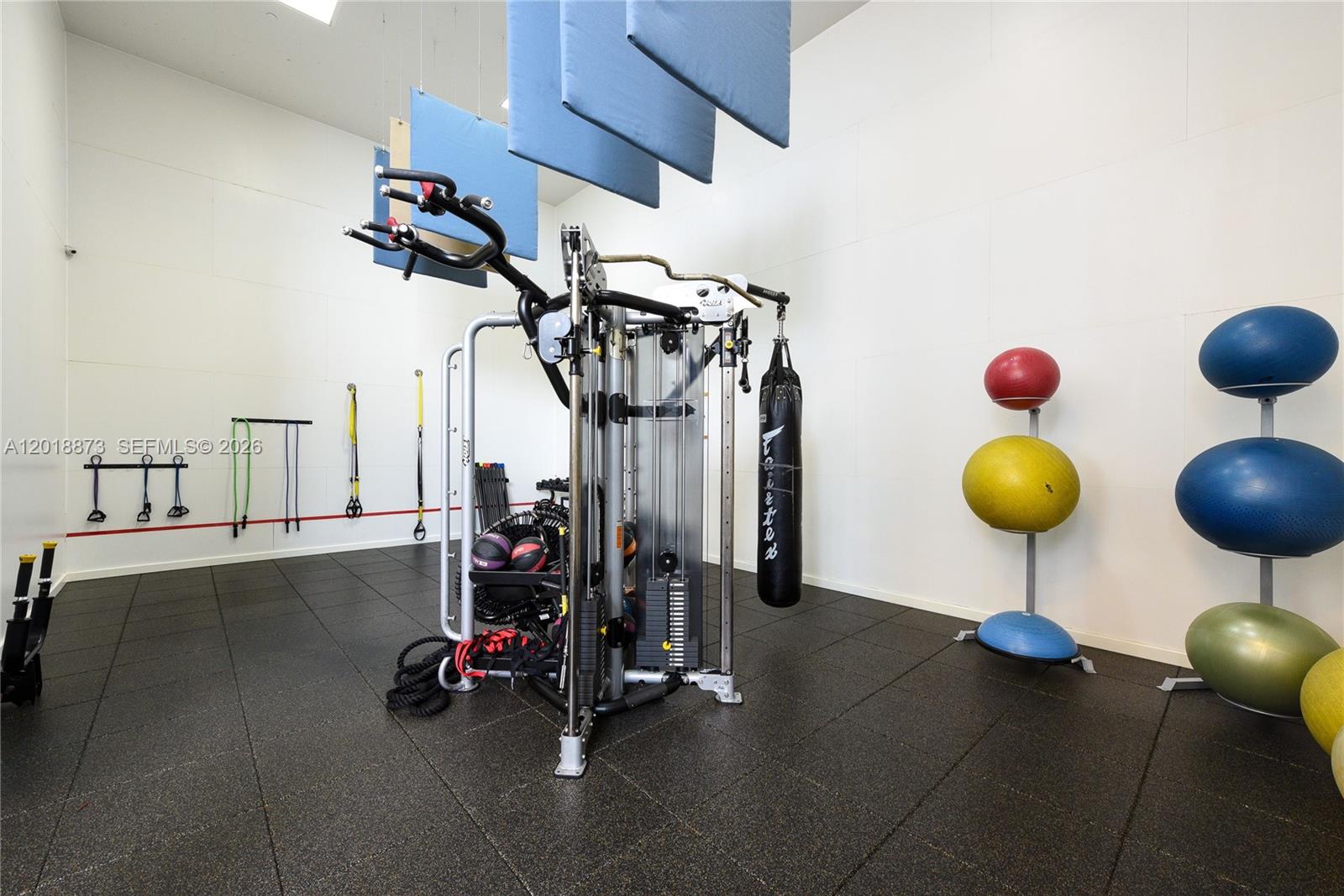 848 Brickell Key Drive, Unit 2703 Miami, FL 33131 - Photo 26 of 30 a view of a room with gym equipment