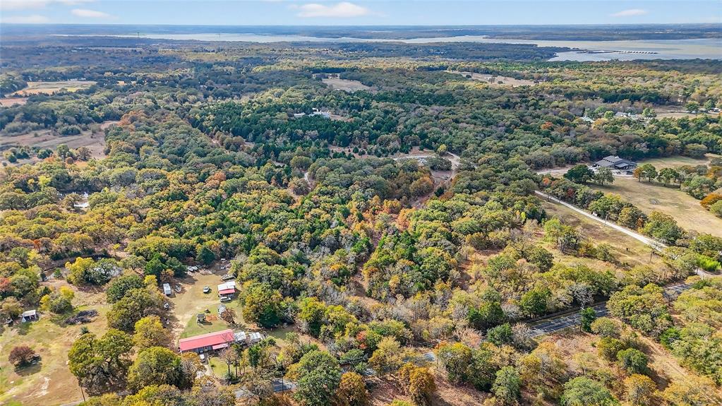 9-ac Locust Road Pottsboro, TX 75076 - Photo 2 of 21 a view of a city with green field
