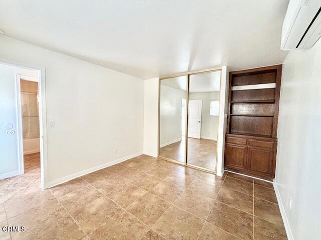 114 Eagle Rock Avenue, Unit ADU Oxnard, CA 93035 - Photo 9 of 10 a view of an empty room with cabinet and a refrigerator