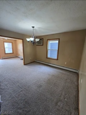 a kitchen with a sink appliances and cabinets