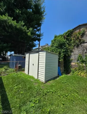 wooden floor with a bathroom
