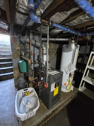 a view of a hallway with wooden floor and a hallway