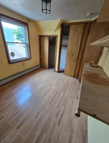 a view of a house with a yard porch and a garden