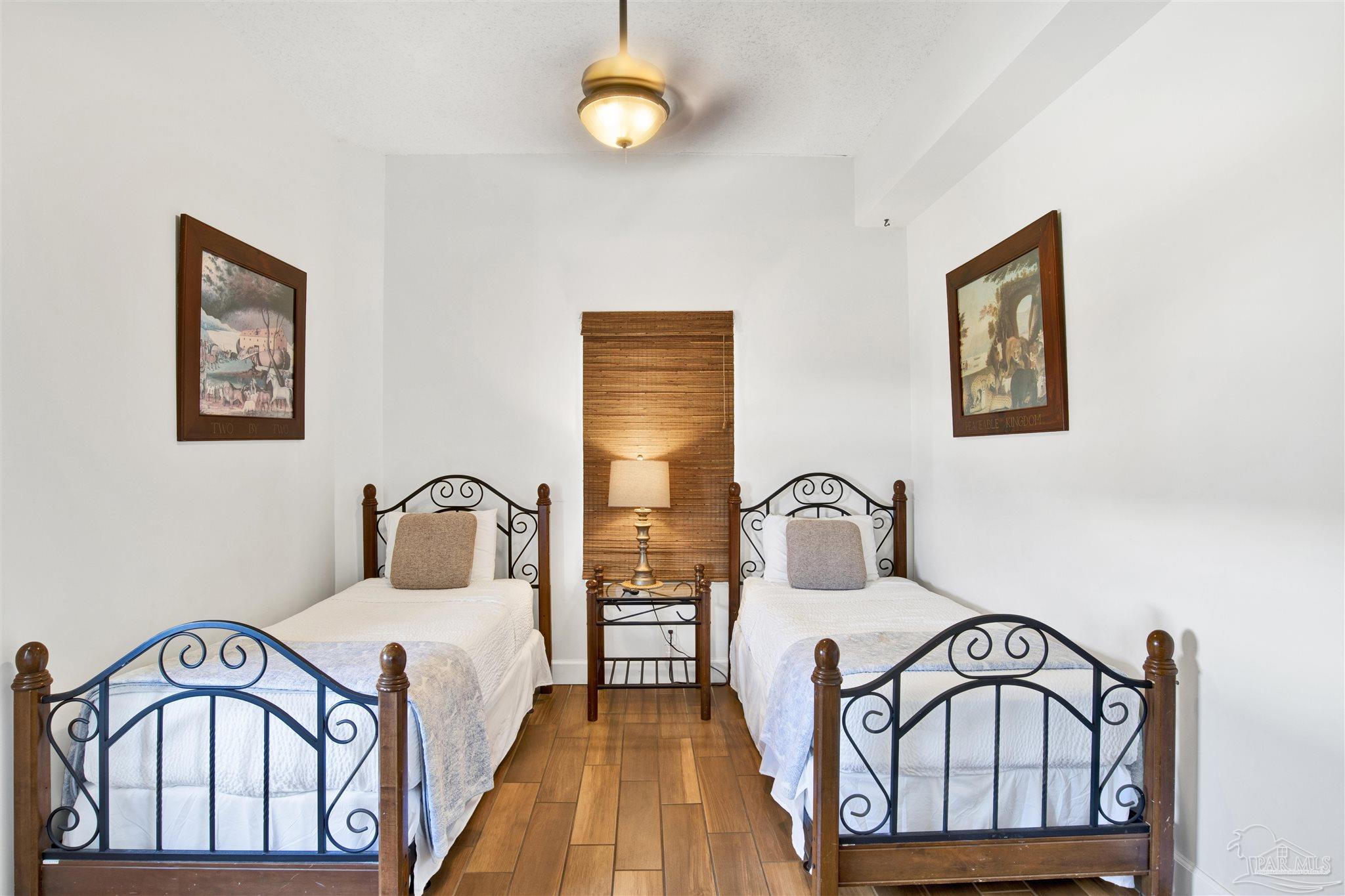 14511 Perdido Key Drive, Unit 408 Perdido Key, FL 32507 - Photo 27 of 43 a bedroom with a bed and a large window