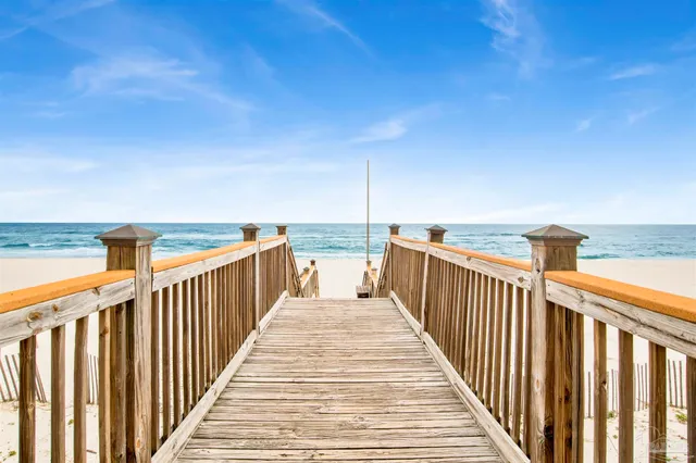 a view of a balcony with wooden floor