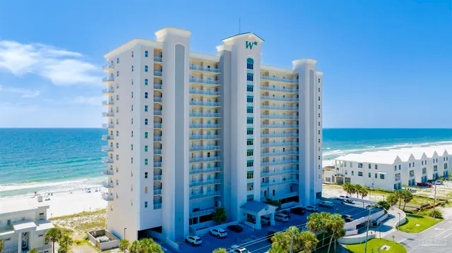 a view of a city with an ocean view