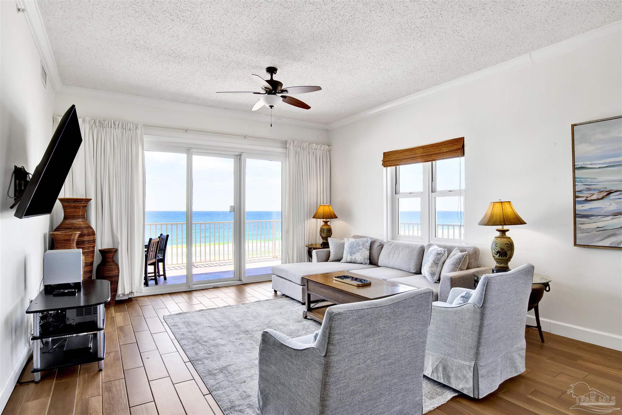 14511 Perdido Key Drive, Unit 408 Perdido Key, FL 32507 - Photo 6 of 43 a living room with furniture and a floor to ceiling window