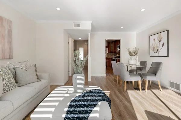 a living room with furniture and a couch