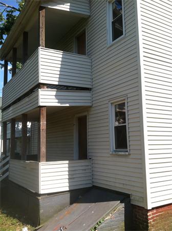 46-48 Windsor Street Springfield, MA 01105 - Photo 4 of 7 a view of a house with a door and a balcony