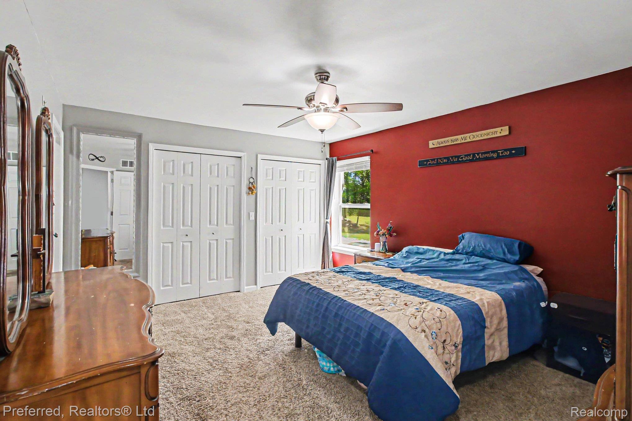 6366 Dutcher Road Howell, MI 48843 - Photo 13 of 33 Bedroom featuring a window, ceiling fan, and carpet flooring