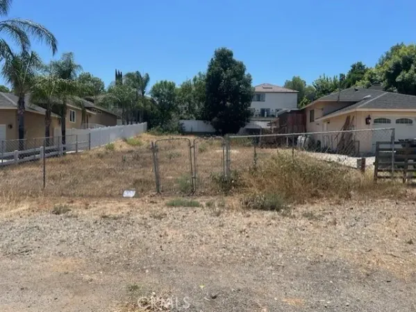a view of backyard with green space
