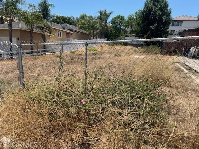 14465 Rock Riverside, CA 92503 - Photo 3 of 11 a backyard of a house with lots of green space and plants