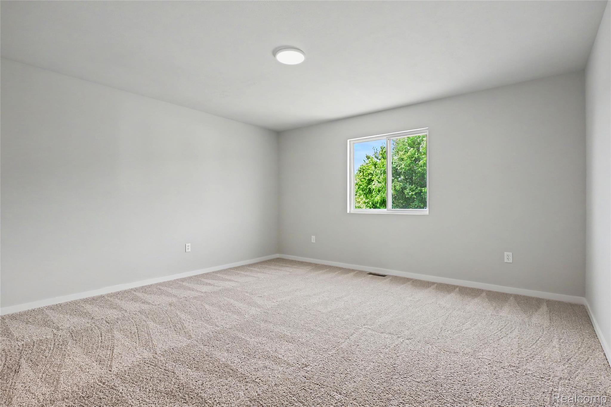 1222 Lockes Street Howell, MI 48843 - Photo 9 of 36 Stock Photo-Primary Bedroom