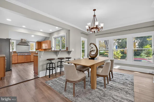 a kitchen with sink and cabinets