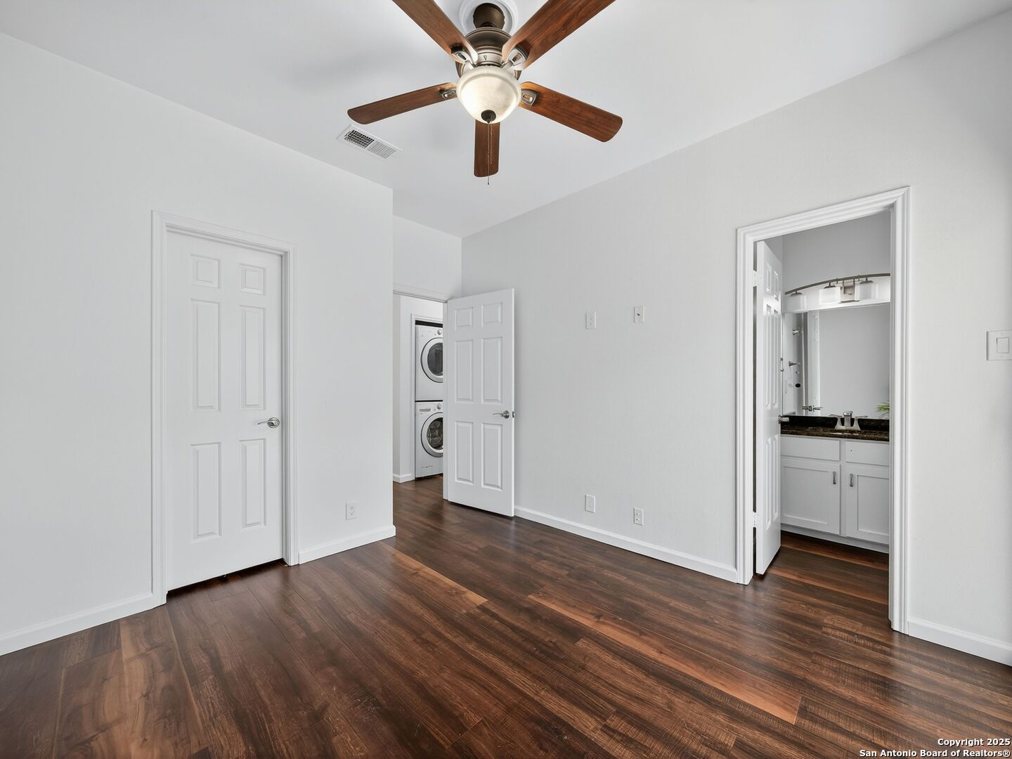 2414 Longview Street, Unit 307 Austin, TX 78705 - Photo 18 of 26 a view of empty room with wooden floor