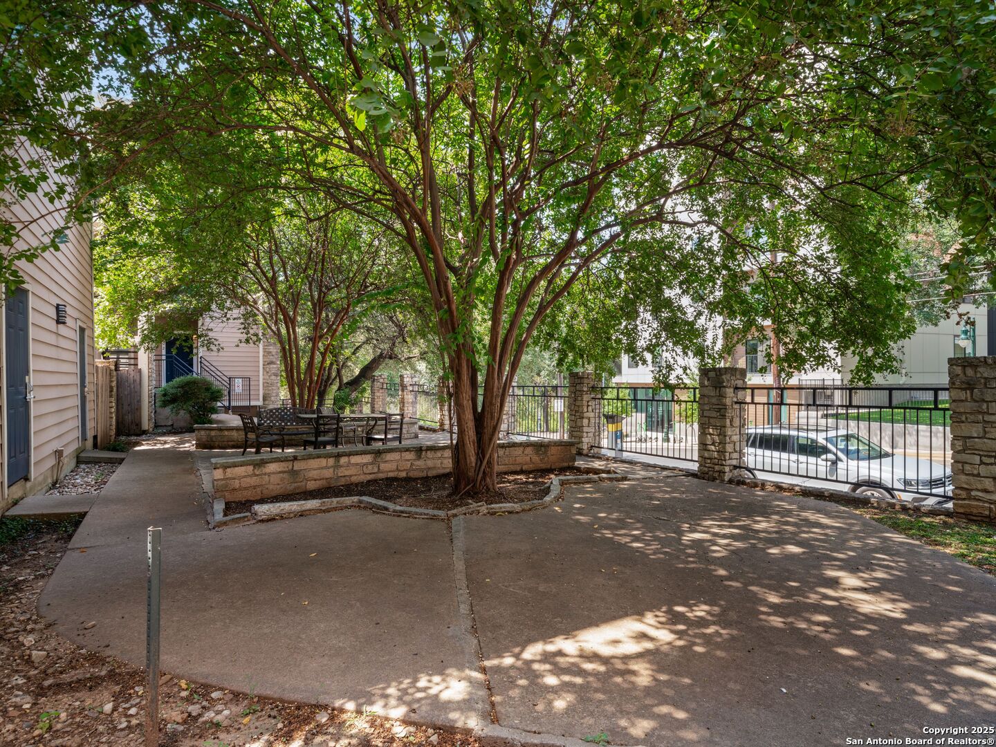 2414 Longview Street, Unit 307 Austin, TX 78705 - Photo 25 of 26 a view of a street with large trees