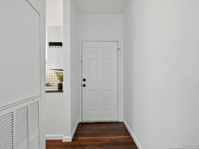 a view of front door with hallway