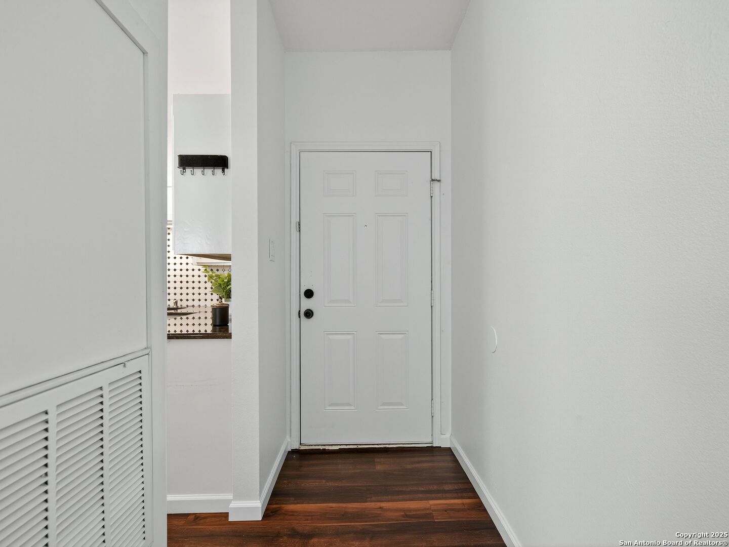 2414 Longview Street, Unit 307 Austin, TX 78705 - Photo 7 of 26 a view of front door with hallway