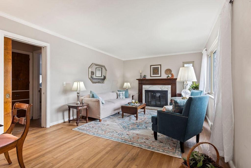 2584 Chester Road Columbus, OH 43221 - Photo 5 of 49 Formal living room with wood-burning fireplace...