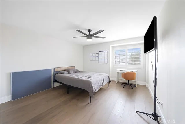 a bed room with furniture and a window