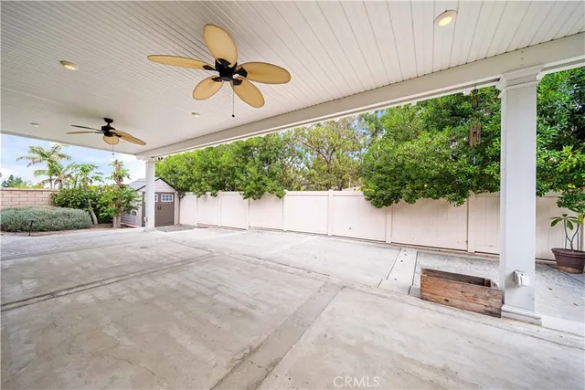 a view of a terrace with a garden and plants