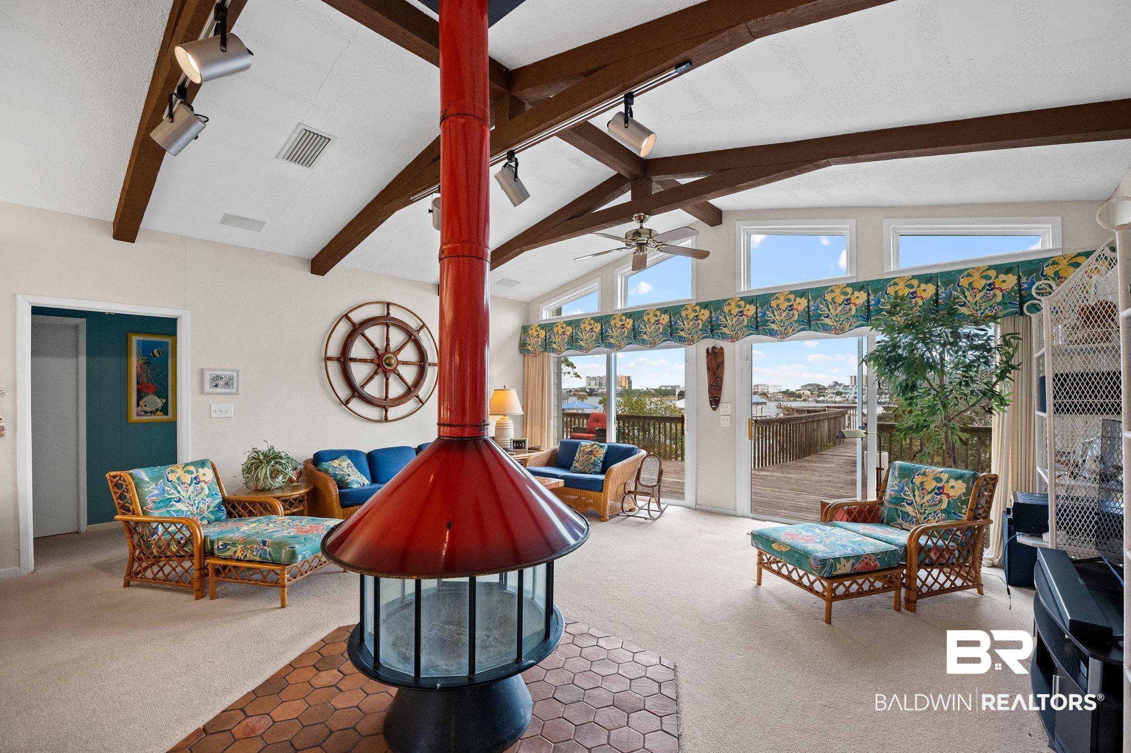 30388 River Road Orange Beach, AL 36561 - Photo 13 of 72 Sunroom / solarium with a ceiling fan, rail lighting, visible vents, and vaulted ceiling with beams