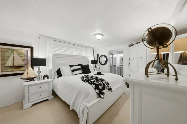 a bedroom with a bed and a closet