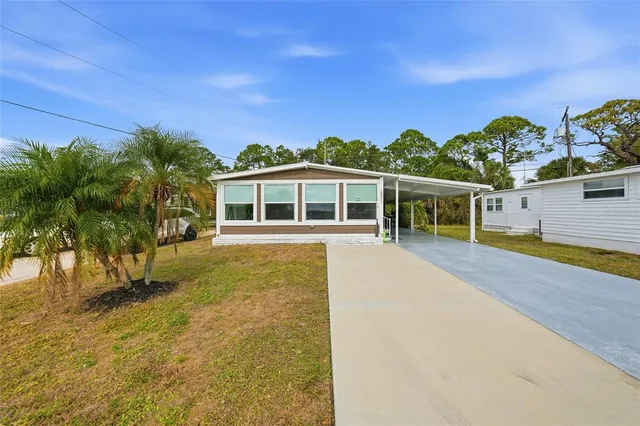 a view of a street with a building in the background
