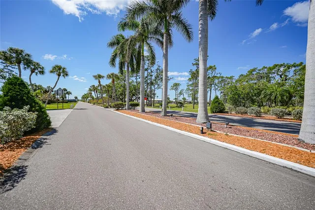 a view of a lake with a yard