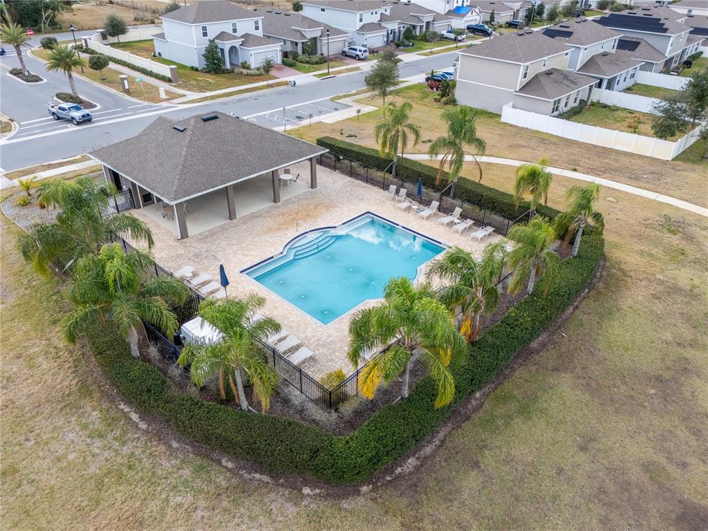1257 Hendon Loop Davenport, FL 33837 - Photo 2 of 16 an aerial view of a house with a garden