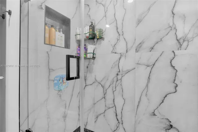 a vase of flowers sitting on a white table