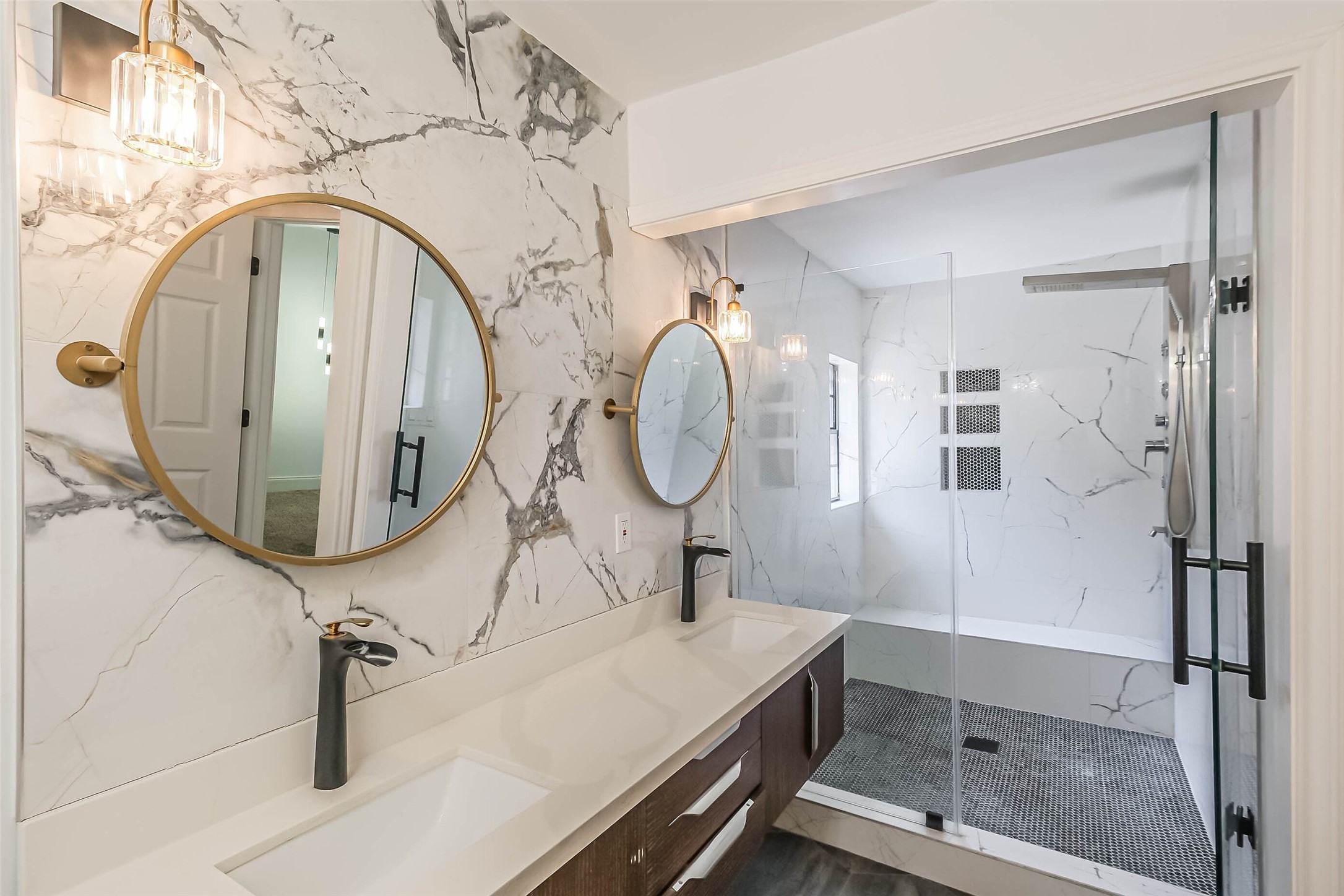11019 Clodine Road Sugar Land, TX 77498 - Photo 21 of 39 a bathroom with a sink a mirror and a shower