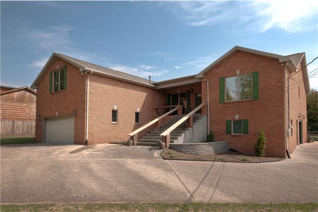 245 Quarry Road Mount Juliet, TN 37122 - Photo 2 of 19 The home was built in 1997 and is made of solid brick. Notice the two-car garage on the left; it has an internal entrance to the home, which is perfect for those rainy days!