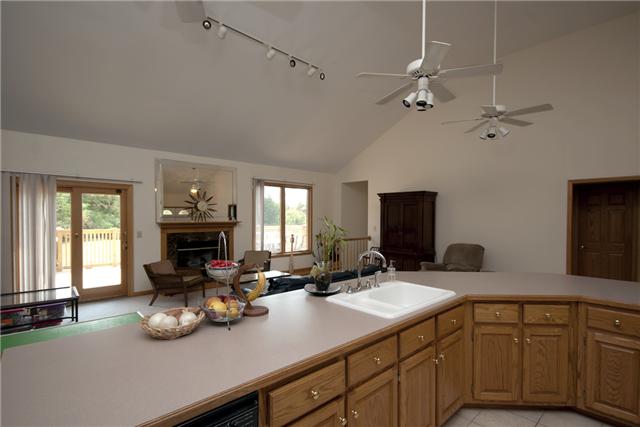 245 Quarry Road Mount Juliet, TN 37122 - Photo 6 of 19 This image features another shot of the kitchen counter/island, which overlooks the living room.