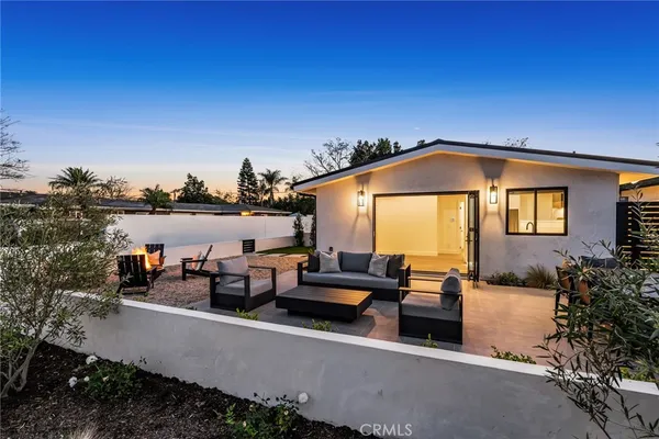 a view of a terrace with chairs