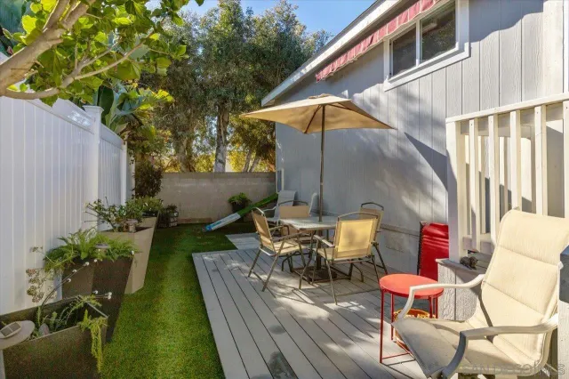 a bedroom with a bed and a table