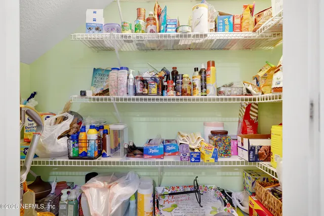 a view of storage and utility room