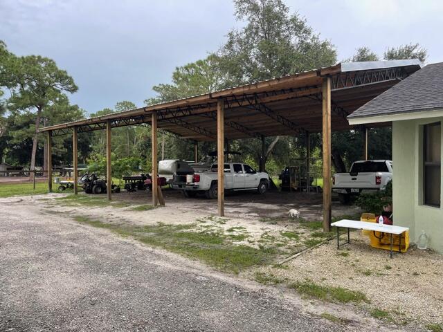 12667 Kazee Road Loxahatchee Groves, FL 33470 - Photo 2 of 22 4A1C9D3E-A4CE-40E4-BD54-5EE4C707372C