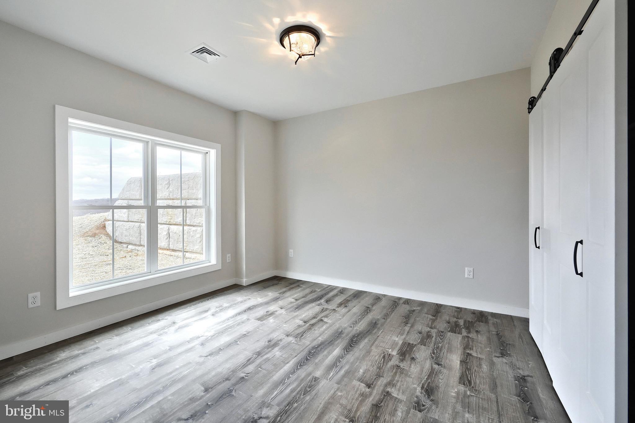 1424 Manor Road Windsor, PA 17366 - Photo 44 of 55 LOWER LEVEL BEDROOM ONE