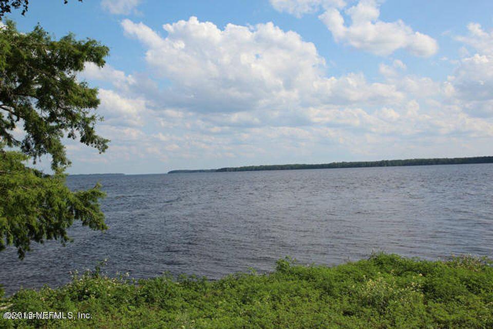 5573 Steamboat Road St. Augustine, FL 32092 - Photo 1 of 8 a view of a lake